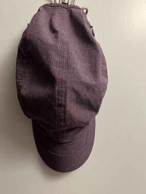 Duluth Trading Co. L/XL Purple Athletic Hat with stash zipper pockets.